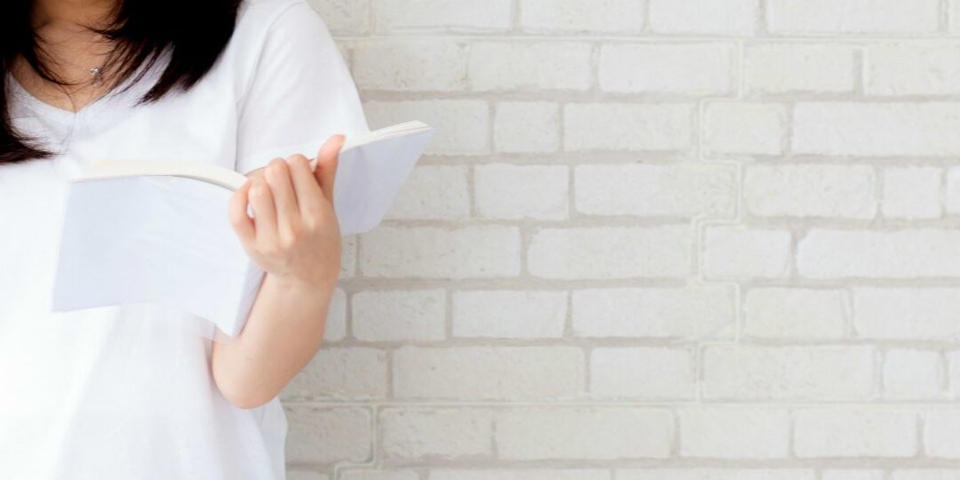banner Girl book white wall SA SPH page